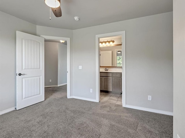 10740 Starboard Way, Edmond, OK 73025 - unfurnished bedroom with light colored carpet and ensuite bathroom