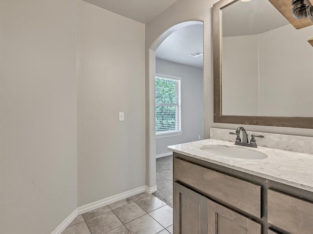 10740 Starboard Way, Edmond, OK 73025 - bathroom with vanity and tile patterned floors