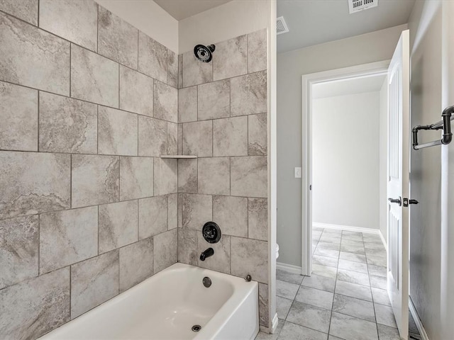 10740 Starboard Way, Edmond, OK 73025 - bathroom featuring shower / tub combination and tile patterned flooring