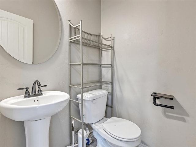 10740 Starboard Way, Edmond, OK 73025 - bathroom featuring toilet and a sink
