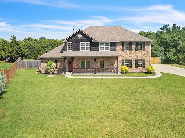 10740 Starboard Way, Edmond, OK 73025 - view of front of property featuring a porch, roof with shingles, and brick siding