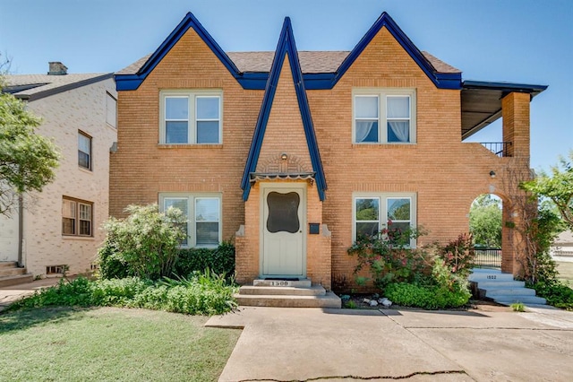 1502 NW 39th St, Oklahoma City, OK 73118 - view of front of home with brick siding and a front lawn