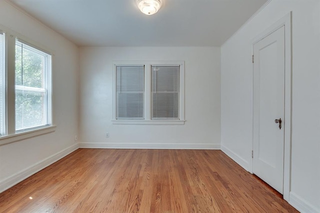 1502 NW 39th St, Oklahoma City, OK 73118 - unfurnished room featuring light wood-style flooring and baseboards