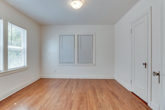 1502 NW 39th St, Oklahoma City, OK 73118 - unfurnished room featuring light wood-type flooring and baseboards