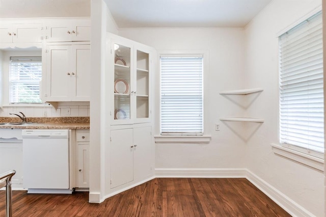 1502 NW 39th St, Oklahoma City, OK 73118 - kitchen with white dishwasher, dark wood-style floors, white cabinets, crown molding, and a sink