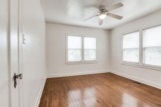 1502 NW 39th St, Oklahoma City, OK 73118 - unfurnished room featuring plenty of natural light, hardwood / wood-style flooring, baseboards, and ceiling fan