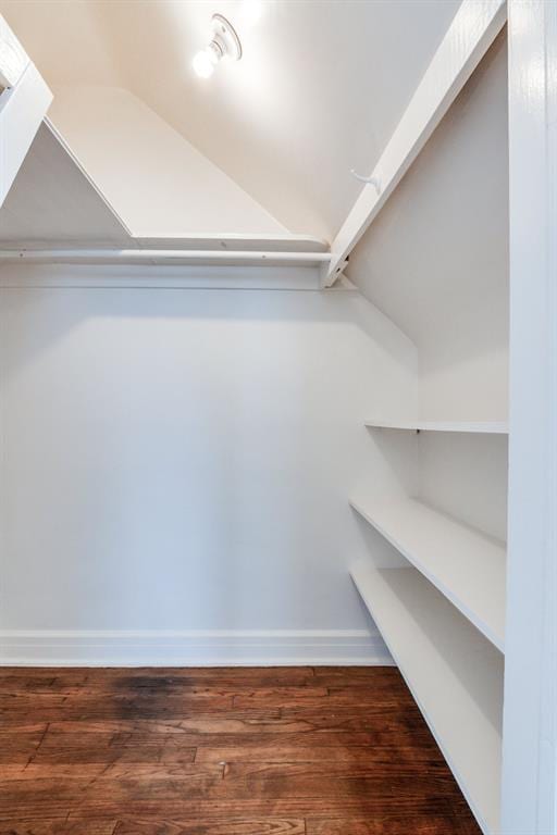 1502 NW 39th St, Oklahoma City, OK 73118 - spacious closet featuring lofted ceiling and wood finished floors