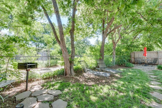 1502 NW 39th St, Oklahoma City, OK 73118 - fenced backyard featuring a patio