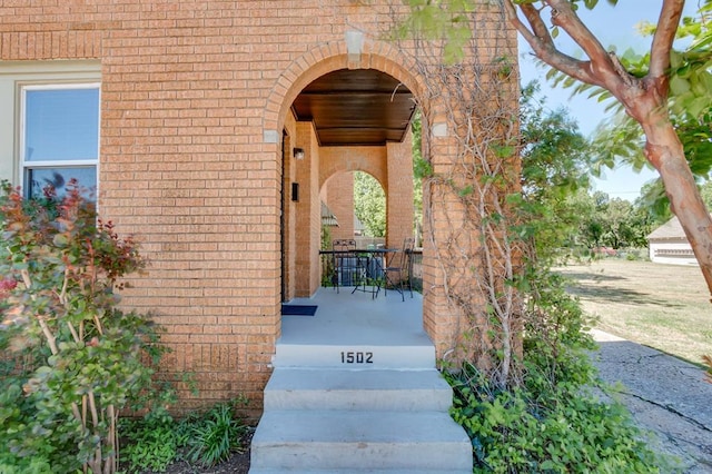 1502 NW 39th St, Oklahoma City, OK 73118 - view of exterior entry with brick siding and covered porch