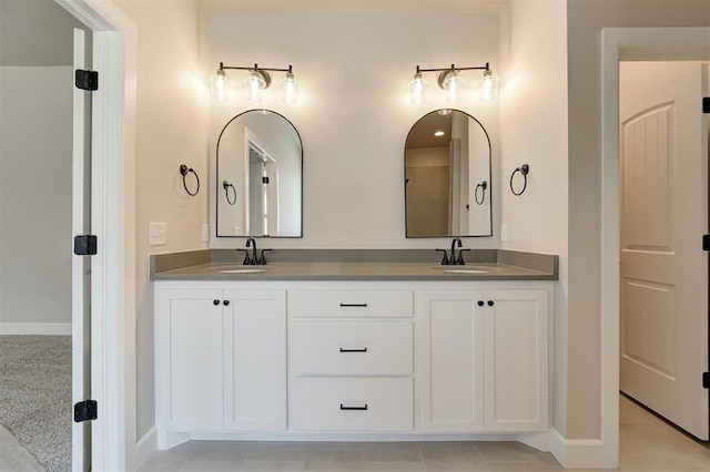 10412 SW 49th St, Mustang, OK 73064 - full bath with double vanity and baseboards