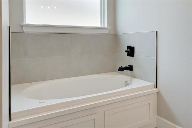 10412 SW 49th St, Mustang, OK 73064 - full bath with a garden tub and baseboards
