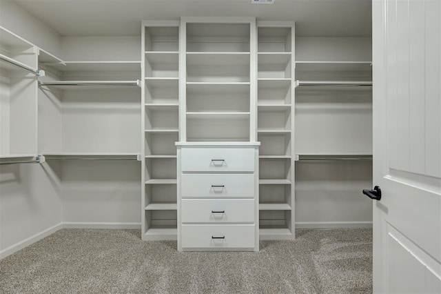 10412 SW 49th St, Mustang, OK 73064 - spacious closet featuring carpet flooring