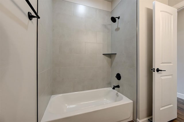 10412 SW 49th St, Mustang, OK 73064 - full bath with shower / bathtub combination, baseboards, and wood finished floors