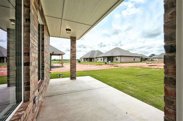 10412 SW 49th St, Mustang, OK 73064 - view of patio featuring a residential view