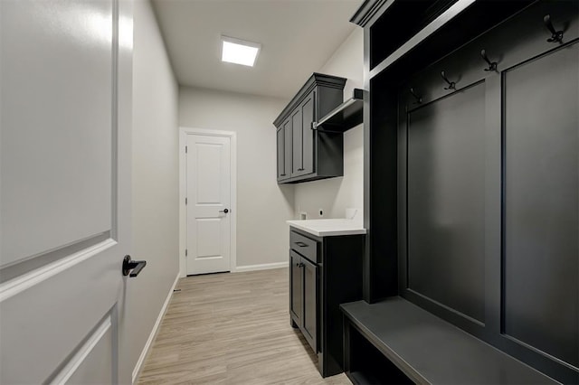 10421 SW 50th St, Mustang, OK 73064 - mudroom with baseboards and light wood-style flooring