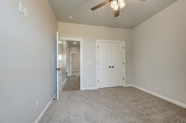10421 SW 50th St, Mustang, OK 73064 - unfurnished bedroom with carpet floors, a ceiling fan, and a closet