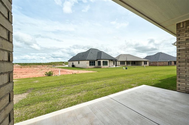 10421 SW 50th St, Mustang, OK 73064 - view of grassy yard with a patio