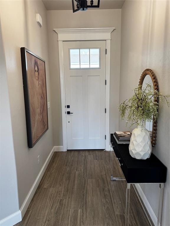 10421 SW 50th St, Mustang, OK 73064 - foyer entrance featuring dark wood finished floors