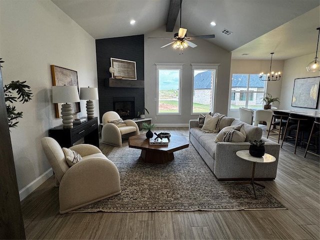 10421 SW 50th St, Mustang, OK 73064 - living room with plenty of natural light, wood finished floors, a large fireplace, and recessed lighting