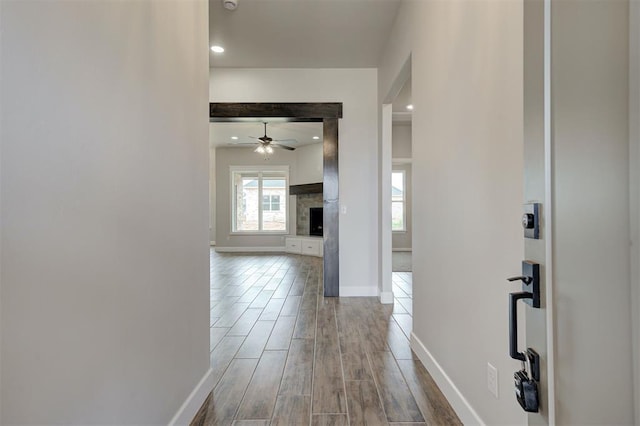 10440 SW 50th St, Mustang, OK 73064 - corridor with baseboards, wood finished floors, and recessed lighting