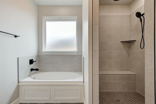 10440 SW 50th St, Mustang, OK 73064 - full bathroom featuring a garden tub and tiled shower