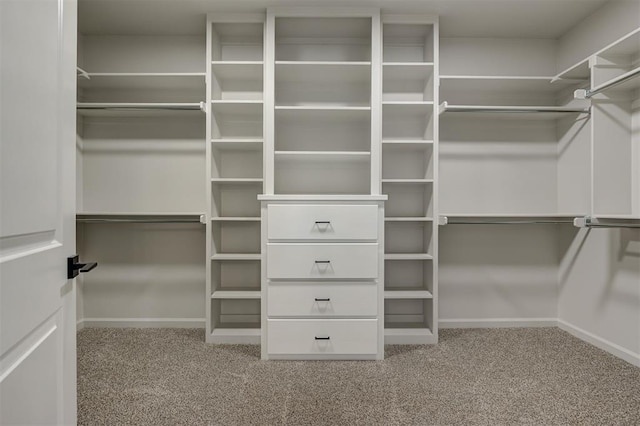 10440 SW 50th St, Mustang, OK 73064 - walk in closet featuring carpet flooring