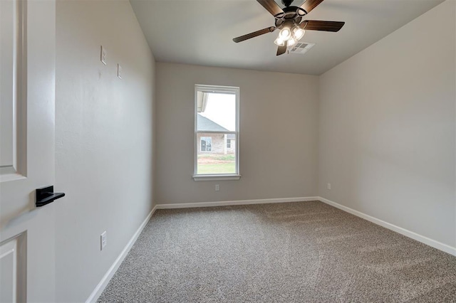 10440 SW 50th St, Mustang, OK 73064 - carpeted spare room featuring baseboards and a ceiling fan