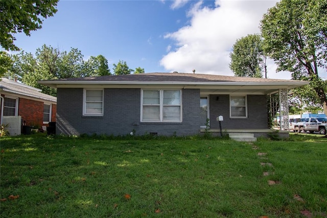 3701 NW 18th St, Oklahoma City, OK 73107 - view of front facade featuring brick siding, a front lawn, and covered porch