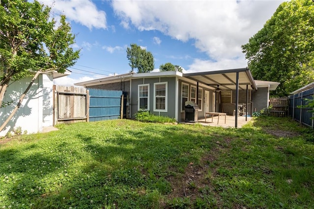 3701 NW 18th St, Oklahoma City, OK 73107 - rear view of property featuring a patio area