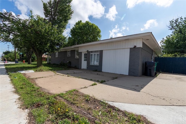 3701 NW 18th St, Oklahoma City, OK 73107 - ranch-style house with brick siding and a patio area