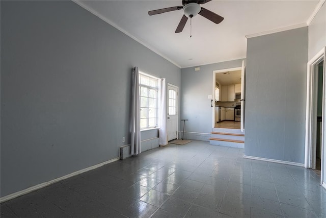 3701 NW 18th St, Oklahoma City, OK 73107 - spare room with ceiling fan, baseboards, and crown molding