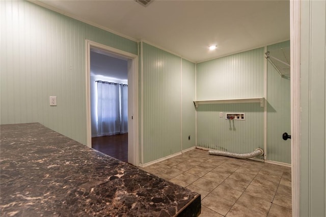 3701 NW 18th St, Oklahoma City, OK 73107 - laundry room featuring washer hookup, ornamental molding, tile patterned flooring, and baseboards