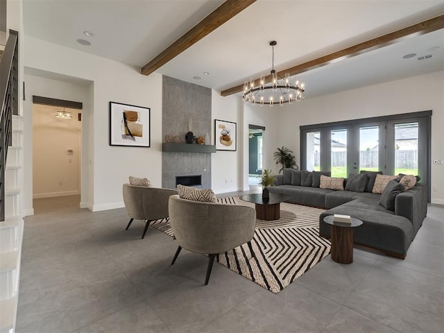 1116 Gateway Bridge Rd, Edmond, OK 73034 - living area with beam ceiling, a fireplace, baseboards, and a chandelier