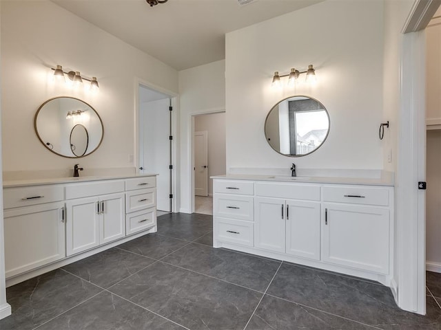 1116 Gateway Bridge Rd, Edmond, OK 73034 - bathroom with two vanities and tile patterned floors