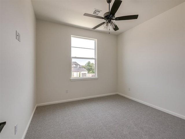 1116 Gateway Bridge Rd, Edmond, OK 73034 - carpeted spare room featuring a ceiling fan and baseboards