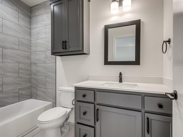 1117 Falls Bridge Ct, Edmond, OK 73034 - bathroom with vanity, toilet, and bathtub / shower combination