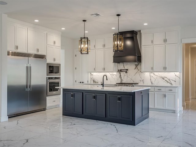 1117 Falls Bridge Ct, Edmond, OK 73034 - kitchen featuring built in appliances, custom range hood, light marble finish floors, white cabinets, and recessed lighting