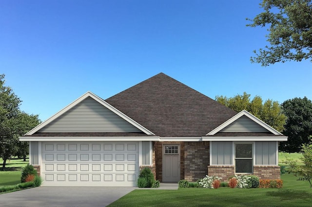 3301 Scissortail Way, Yukon, OK 73099 - view of front of home with roof with shingles, an attached garage, concrete driveway, board and batten siding, and a front lawn