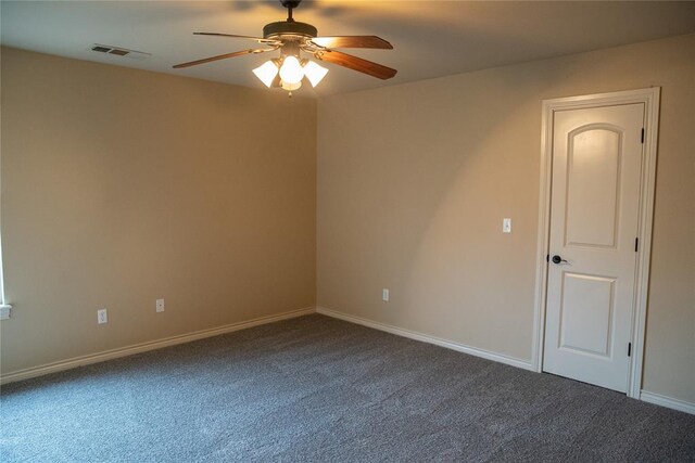 3176 E 146th Pl, Bixby, OK 74008 - spare room featuring a ceiling fan, dark carpet, and baseboards