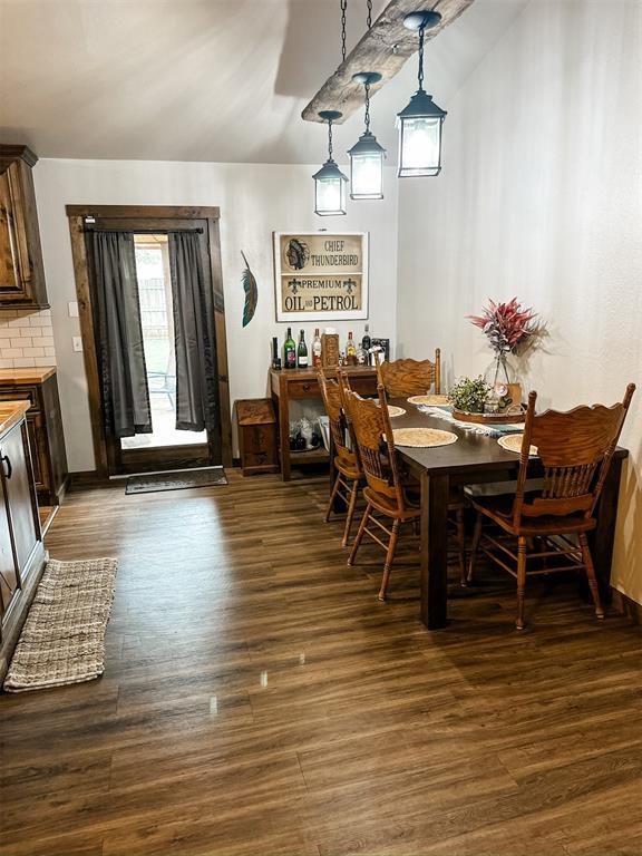 1913 Linwood St, Weatherford, OK 73096 - dining area featuring dark wood finished floors