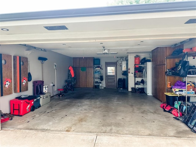 1913 Linwood St, Weatherford, OK 73096 - garage featuring freestanding refrigerator