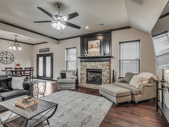 14512 Briarcliff St, Oklahoma City, OK 73170 - living area with dark wood-style flooring, ceiling fan, plenty of natural light, a fireplace, and crown molding