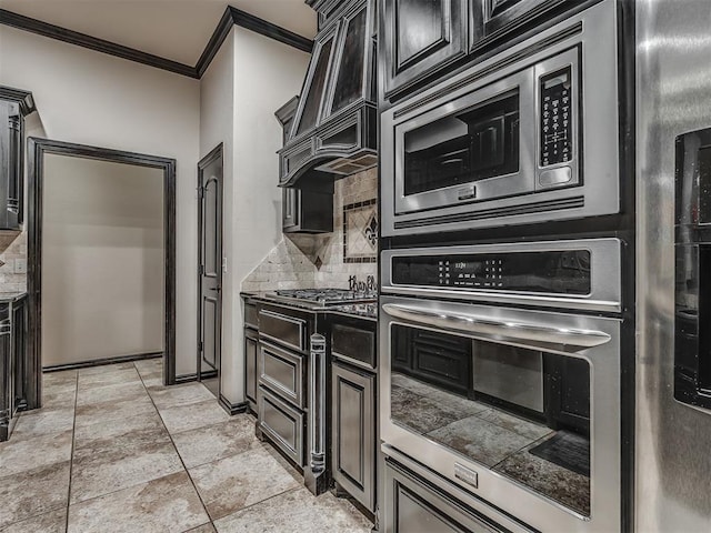 14512 Briarcliff St, Oklahoma City, OK 73170 - kitchen featuring stainless steel appliances, crown molding, tasteful backsplash, and premium range hood
