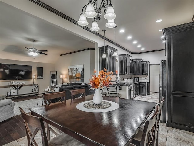 14512 Briarcliff St, Oklahoma City, OK 73170 - dining room with a ceiling fan, ornamental molding, a chandelier, and recessed lighting