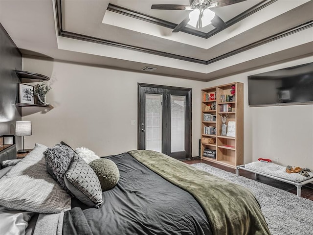 14512 Briarcliff St, Oklahoma City, OK 73170 - bedroom with a raised ceiling, access to exterior, ornamental molding, and ceiling fan