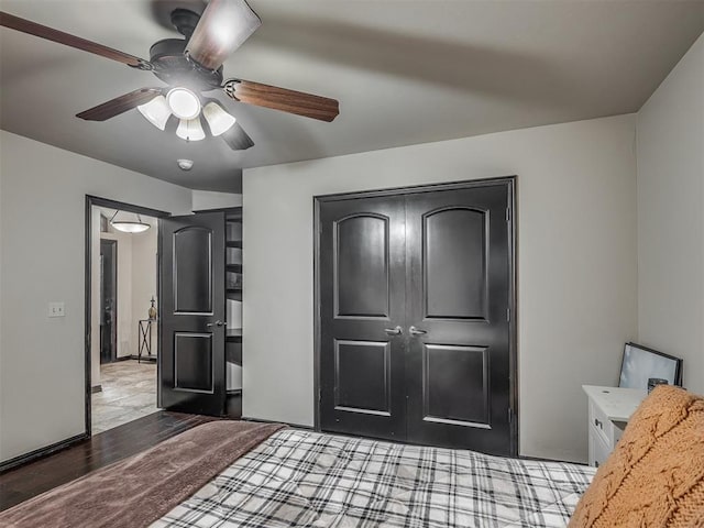 14512 Briarcliff St, Oklahoma City, OK 73170 - bedroom featuring light wood-style flooring, a closet, and a ceiling fan