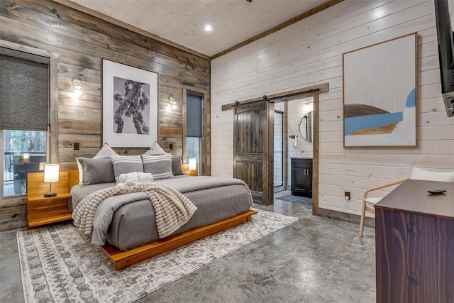 166 Morning Berry Trl, Broken Bow, OK 74728 - bedroom featuring wood walls, a barn door, concrete floors, recessed lighting, and ensuite bath