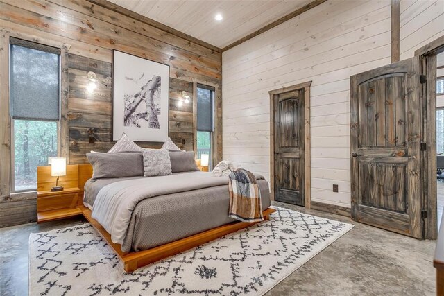 166 Morning Berry Trl, Broken Bow, OK 74728 - bedroom with concrete floors, wooden walls, recessed lighting, and wood ceiling