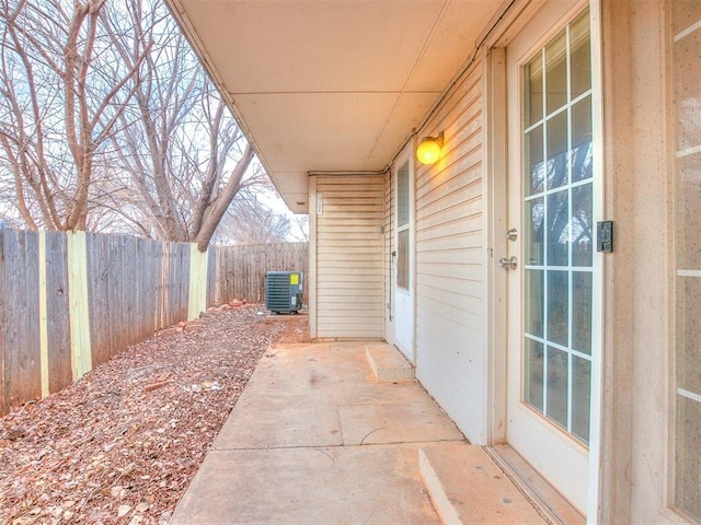400 W 10th St, Edmond, OK 73003 - view of patio featuring central AC unit