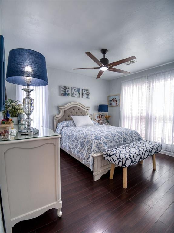 3109 SW 45th St, Oklahoma City, OK 73119 - bedroom with dark wood finished floors and ceiling fan